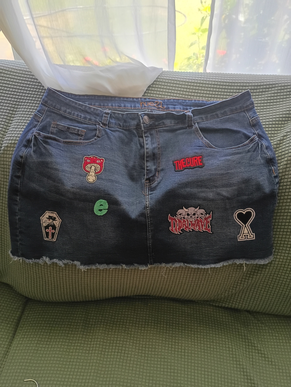 Rue21 blue denim skirt with orange logo stitching